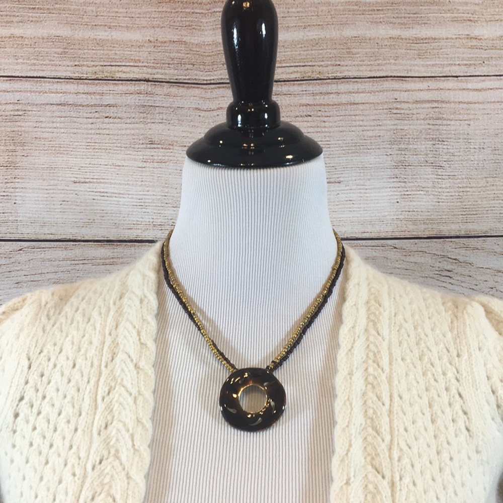 Brown medallion necklace